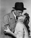 shot of Jose Ferrer & Julie London kissing, from "The Great Man" [1956] movie